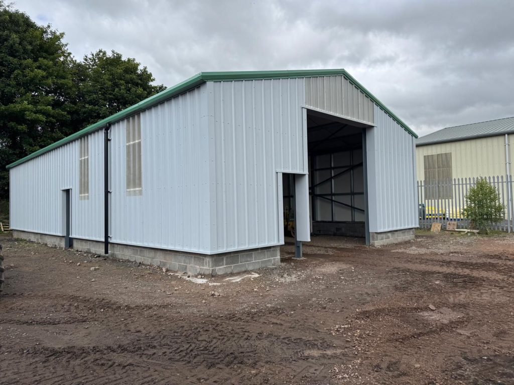 White and green steel building